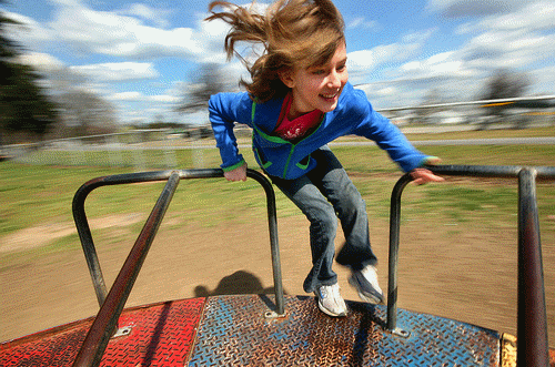 A Person in a Mery go round: